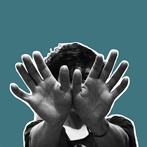 Black and white album cover with a person obscuring their face with hands.