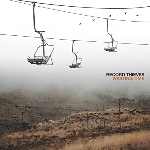 Album cover with empty ski lifts over a foggy, barren landscape.