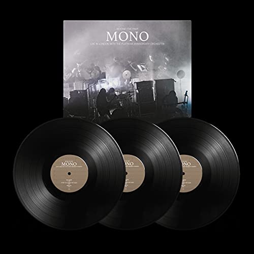 Three vinyl records with album cover depicting a band performing live.