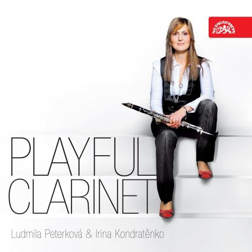 "Album cover featuring a woman holding a clarinet, sitting on white steps."