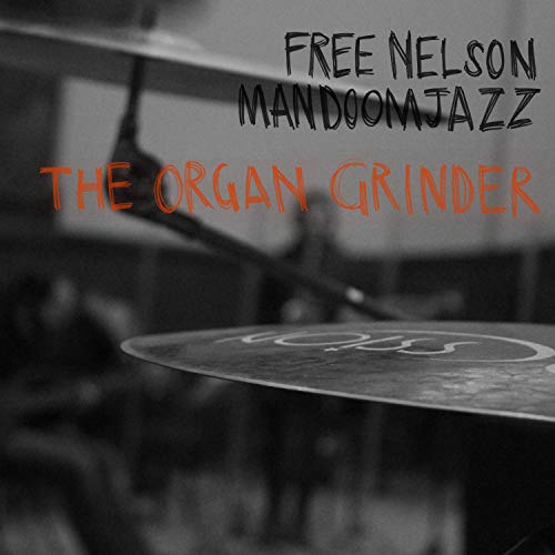 CD cover for “The Organ Grinder” by Free Nelson Mandoomjazz, with cymbals.