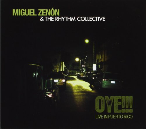 CD case featuring musicians Zenon and Miguel, likely live performance imagery.