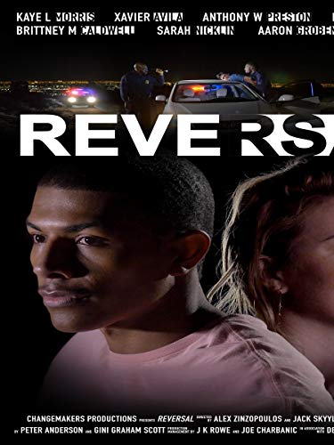 Reversal" DVD cover with two faces and police scene in background.