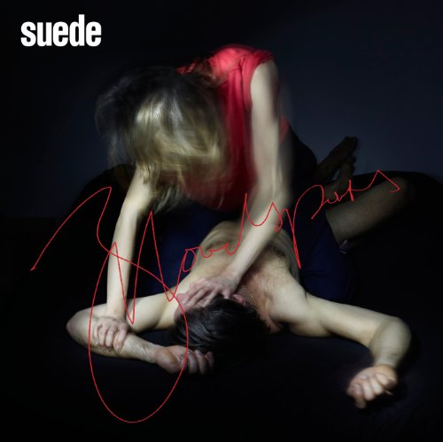 "Album cover featuring a man and woman in a dramatic, intertwined pose against a dark background."