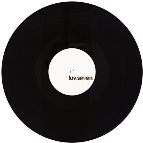Black vinyl record with a white center label reading "luv.seven".