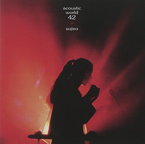 Red album cover with silhouette of a woman playing guitar.