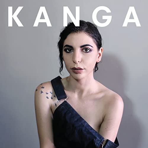 CD cover featuring a portrait of a woman with dark hair and makeup.