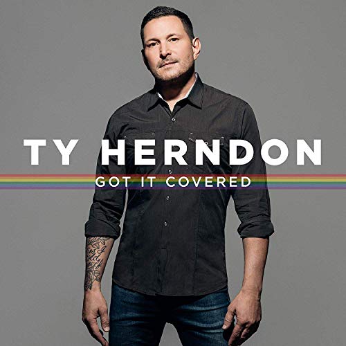 "Album cover featuring Ty Herndon in a black shirt, with rainbow stripe and text."
