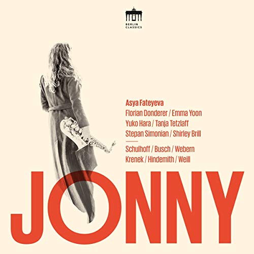 Album cover with woman holding saxophone, beige background, and red text "Jonny".