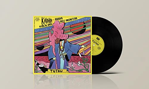 Vinyl record with colorful album art featuring a stylized figure.