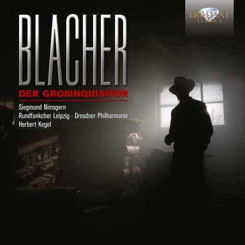 "CD cover with a man in a hat standing in a dark, misty room."