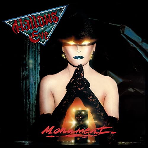 Hallows Eve album cover: woman with glowing eyes and lace gloves.
