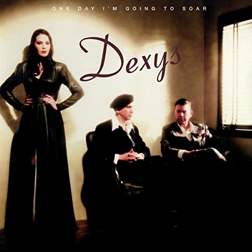 Album cover for Dexys’ “One Day I’m Going to Soar” featuring three people.
