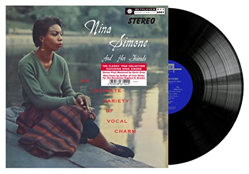 Nina Simone album cover and black vinyl record, 2021 remaster.