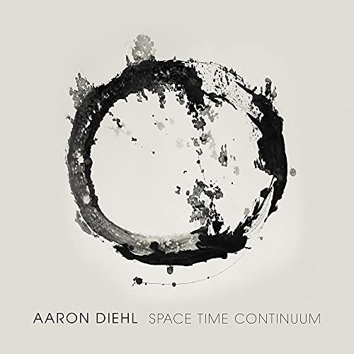 CD cover: abstract black and white circular splash art, text below.