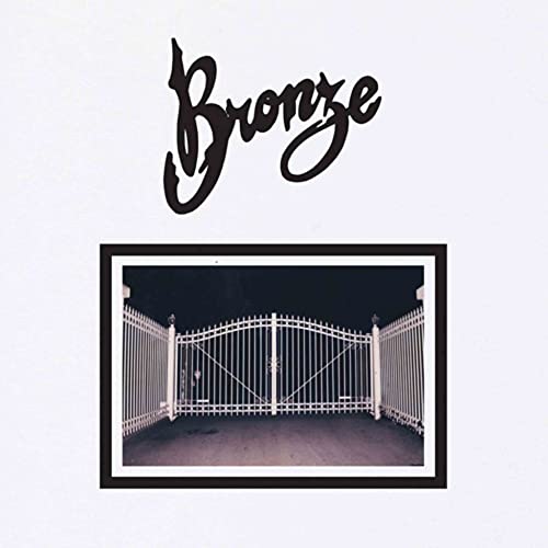 CD cover with ornate “Bronze” text over a gate image.