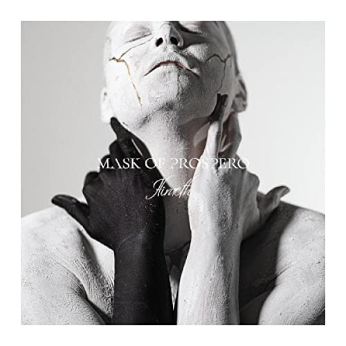 Pale face with cracked texture and dark hands, album cover art.