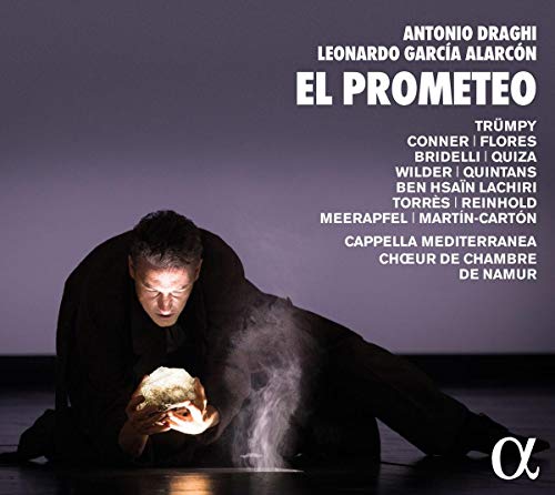 A man crouches, holding a skull, on a CD cover with white text.