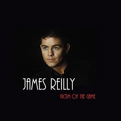 "CD cover with a man's portrait and text 'James Reilly - Victim Of The Game'."