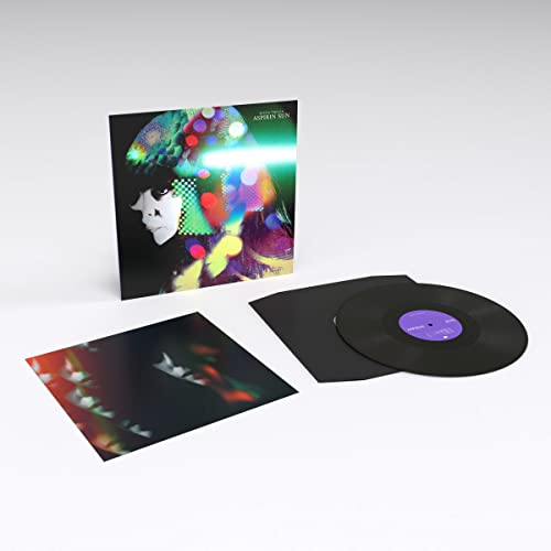 Vinyl record of Emma Tricca’s “Aspirin Sun” with colorful album art.