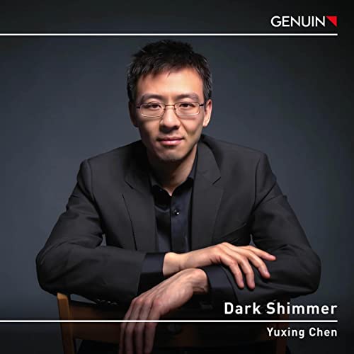 CD cover featuring a portrait of pianist Yuxing Chen in a suit.