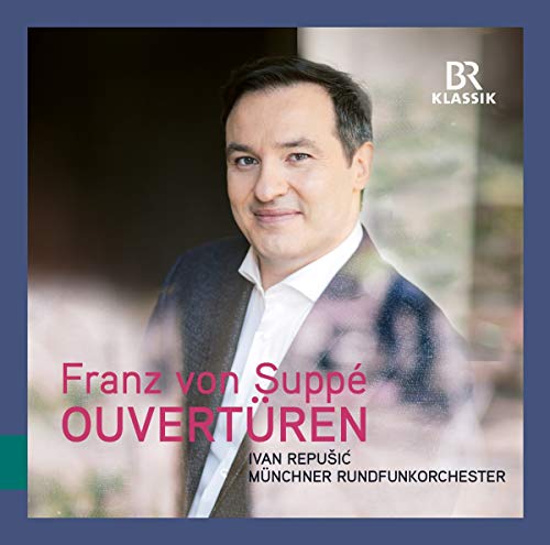 CD cover with a man's portrait and pink and black text on a blurred background.