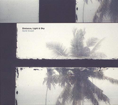 The alt text for the image is: "Black and white vinyl album cover with palm trees and torn edges."