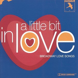 CD cover with red heart design and text āa little bit in loveā.