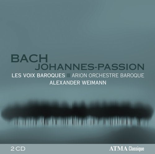 A blue-grey CD cover with text and a dark, blurry, sound wave image.