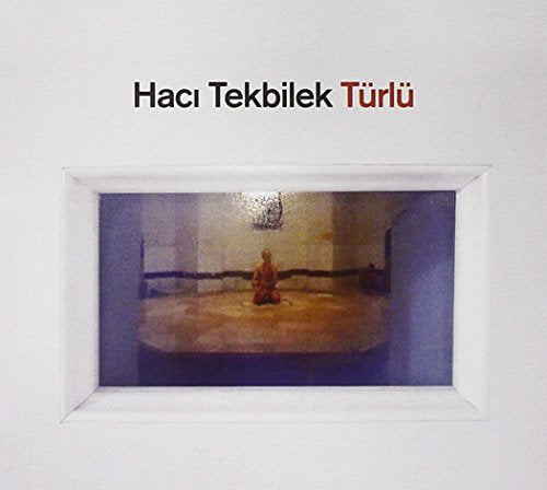 CD cover with a framed image of a person in a room.