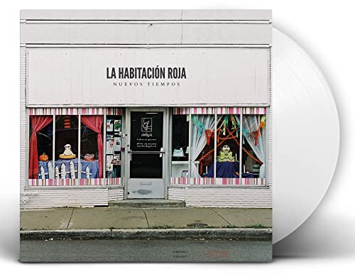 White vinyl record with album cover depicting a storefront and dolls.