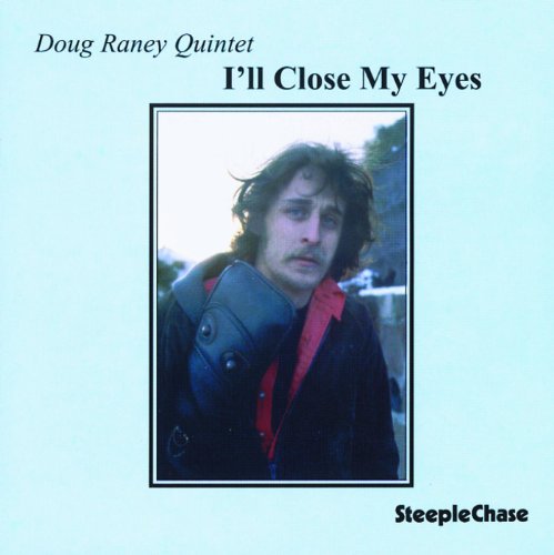 CD album cover with a man in a leather jacket on a blue background.