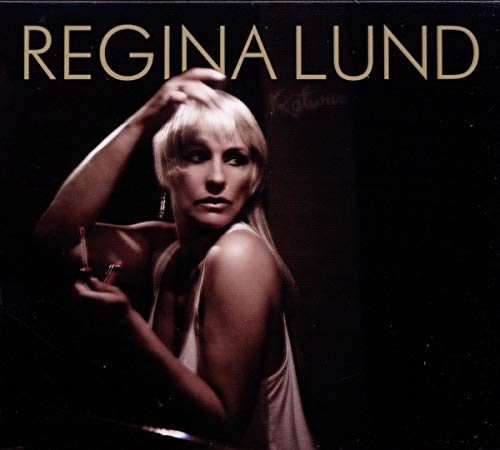 Regina Lund album cover, portrait of a blonde woman with dark background.