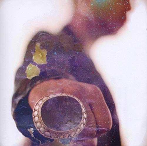 Abstract album cover featuring a hand holding a ring, with cosmic textures.