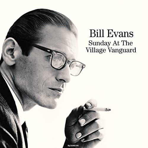 Black and white portrait of Bill Evans with album title text.