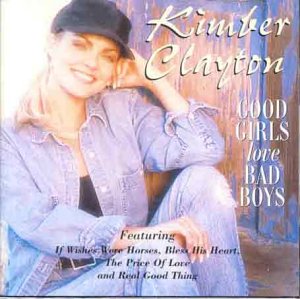 Kimber Clayton's album cover: woman in denim, leaning against a wooden wall, smiling.