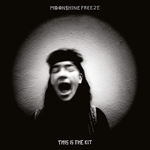 Black and white album cover featuring a person with an open mouth.