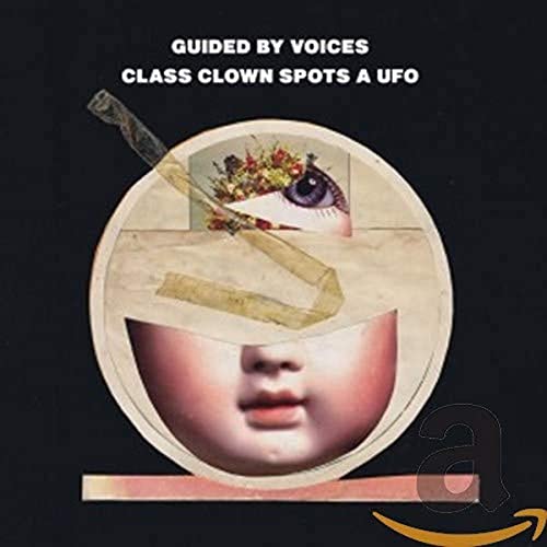 CD cover: collage of a clown face, eye, and floral arrangement.