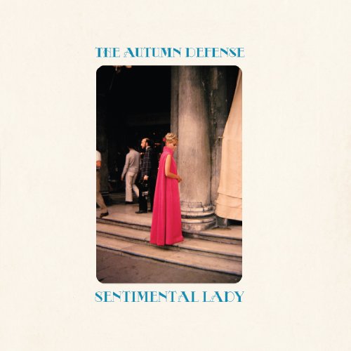 Album cover featuring a woman in a pink dress near a doorway.