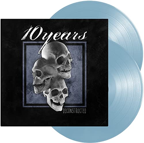 Two light blue vinyl records with a black cover featuring stacked skulls.