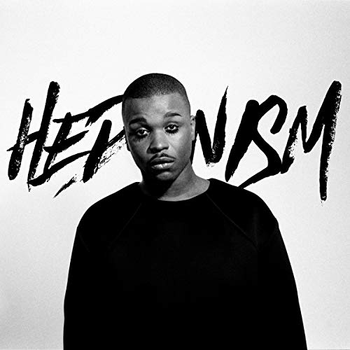 Black and white image of a man with "Hedonism" written behind him.