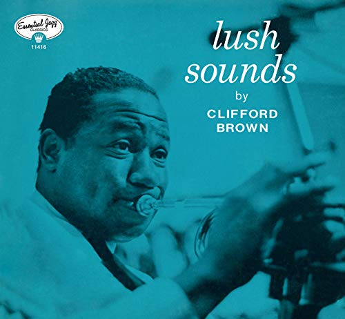"Album cover featuring a man playing trumpet, with blue-toned background and white text."