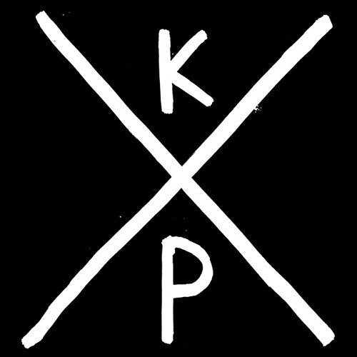 White "KXP" logo on a black background, with crossed lines forming an "X" shape.