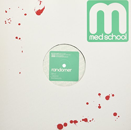 A vinyl record with a green label and white text on a black background.