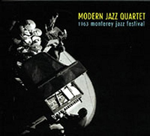 "CD cover with a black-and-white photo of a man playing a piano."