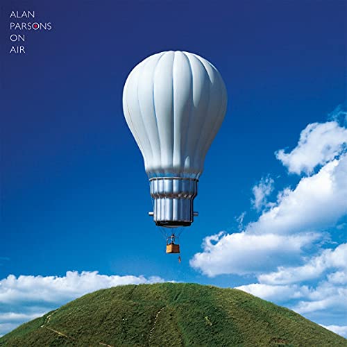 Album cover: hot air balloon over a green hill, blue sky.