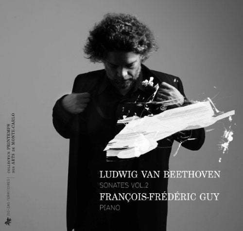 Black and white image of man holding shattered piano, Beethoven sonatas album cover.