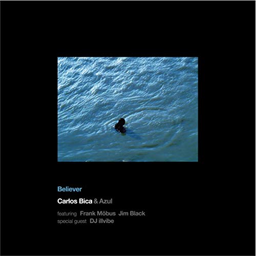 CD cover: a lone figure swimming in blue water.