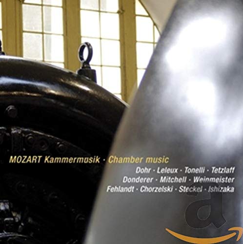 CD cover with a piano and text listing Mozart and musicians.