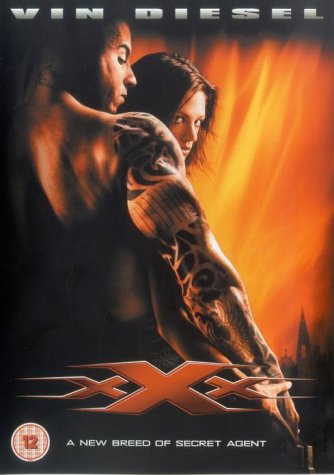"DVD cover for 'xXx' featuring Vin Diesel and a woman against an orange background."